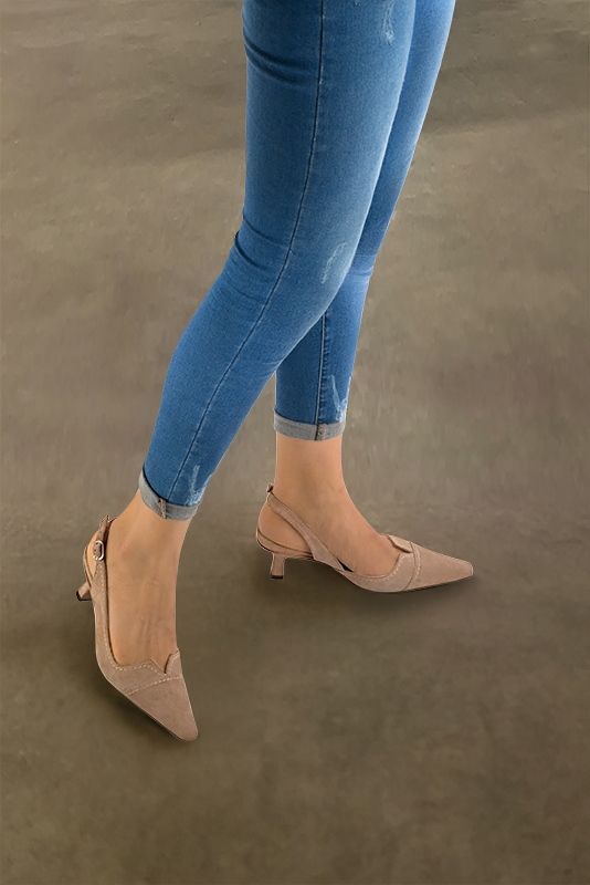 Biscuit beige women's slingback shoes. Tapered toe. Medium spool heels. Worn view - Florence KOOIJMAN